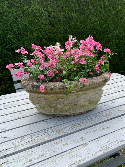 Jardinière en pierre — ovale, guirlande de fleurs